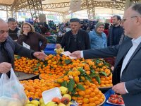 AK Parti'den Fatih Füzün, Akhisar Cuma pazarı esnafını ziyaret etti
